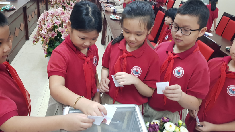 A group of people in red uniforms

Description automatically generated with low confidence