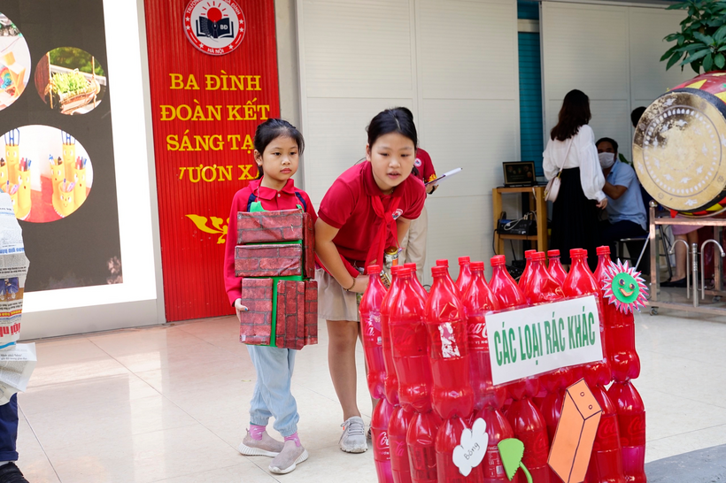 A picture containing text, person

Description automatically generated