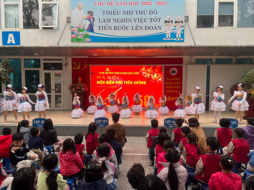 A group of people performing on stage

Description automatically generated with medium confidence