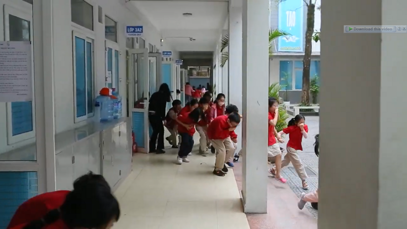 A group of people in a hallway

Description automatically generated with medium confidence