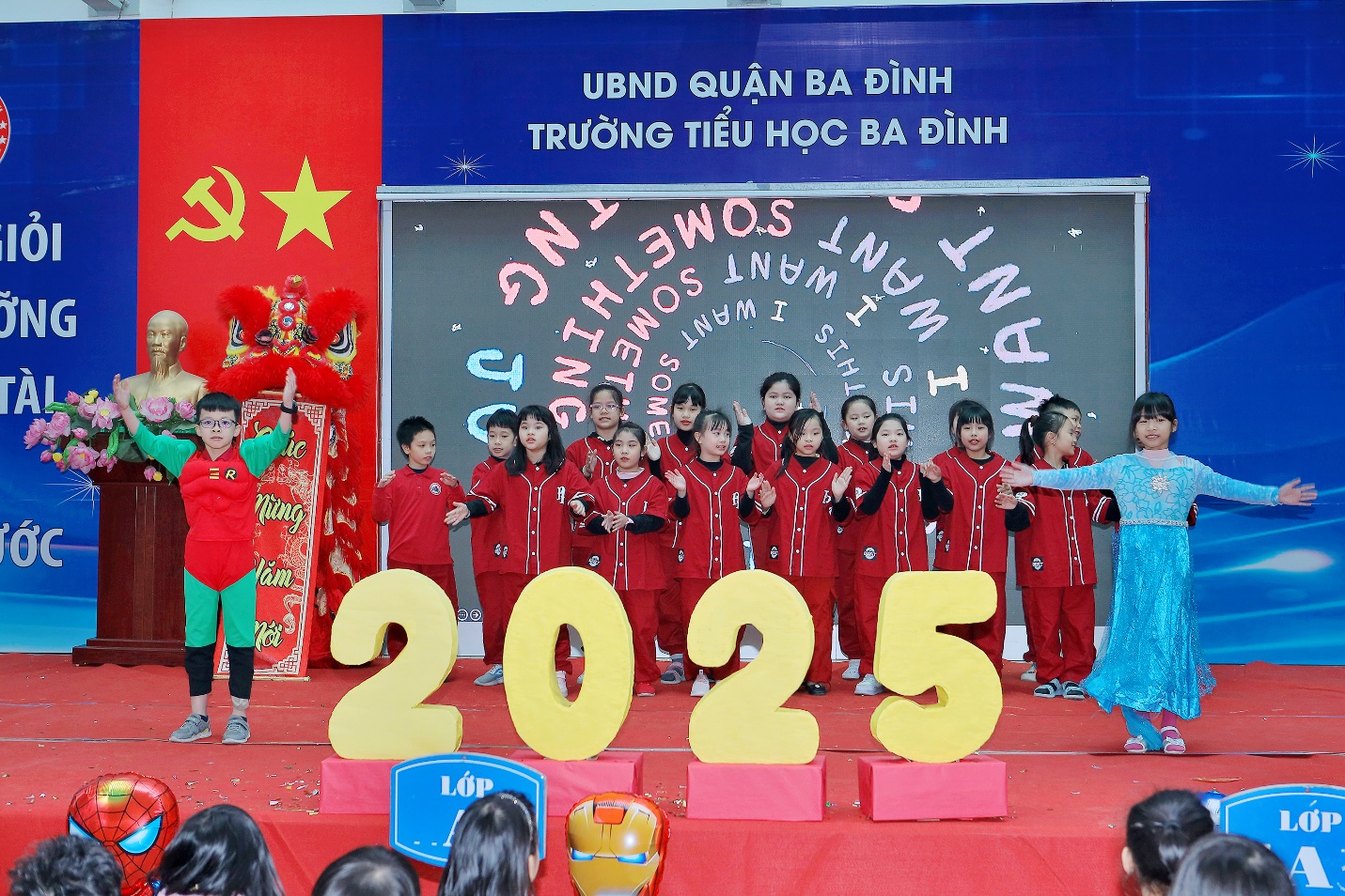 A group of children performing on a stage

Description automatically generated