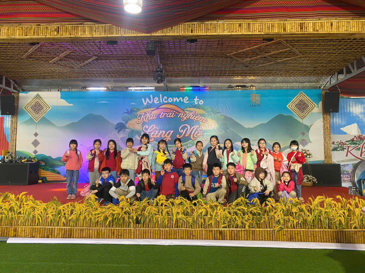 A group of people posing for a photo

AI-generated content may be incorrect.