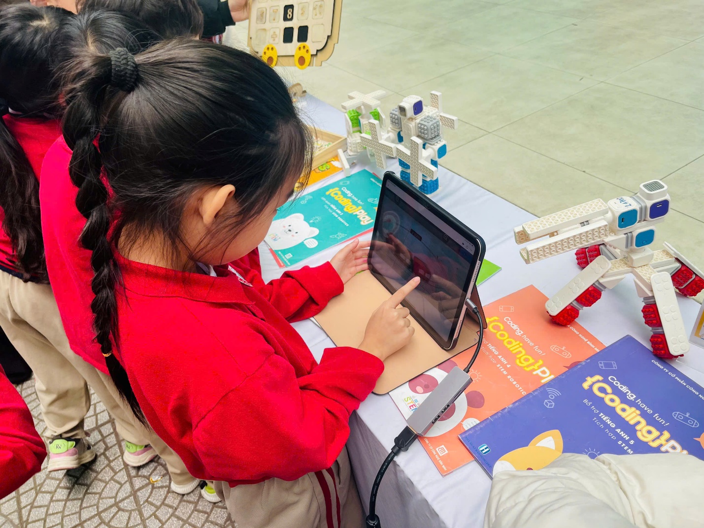 A child using a tablet

AI-generated content may be incorrect.