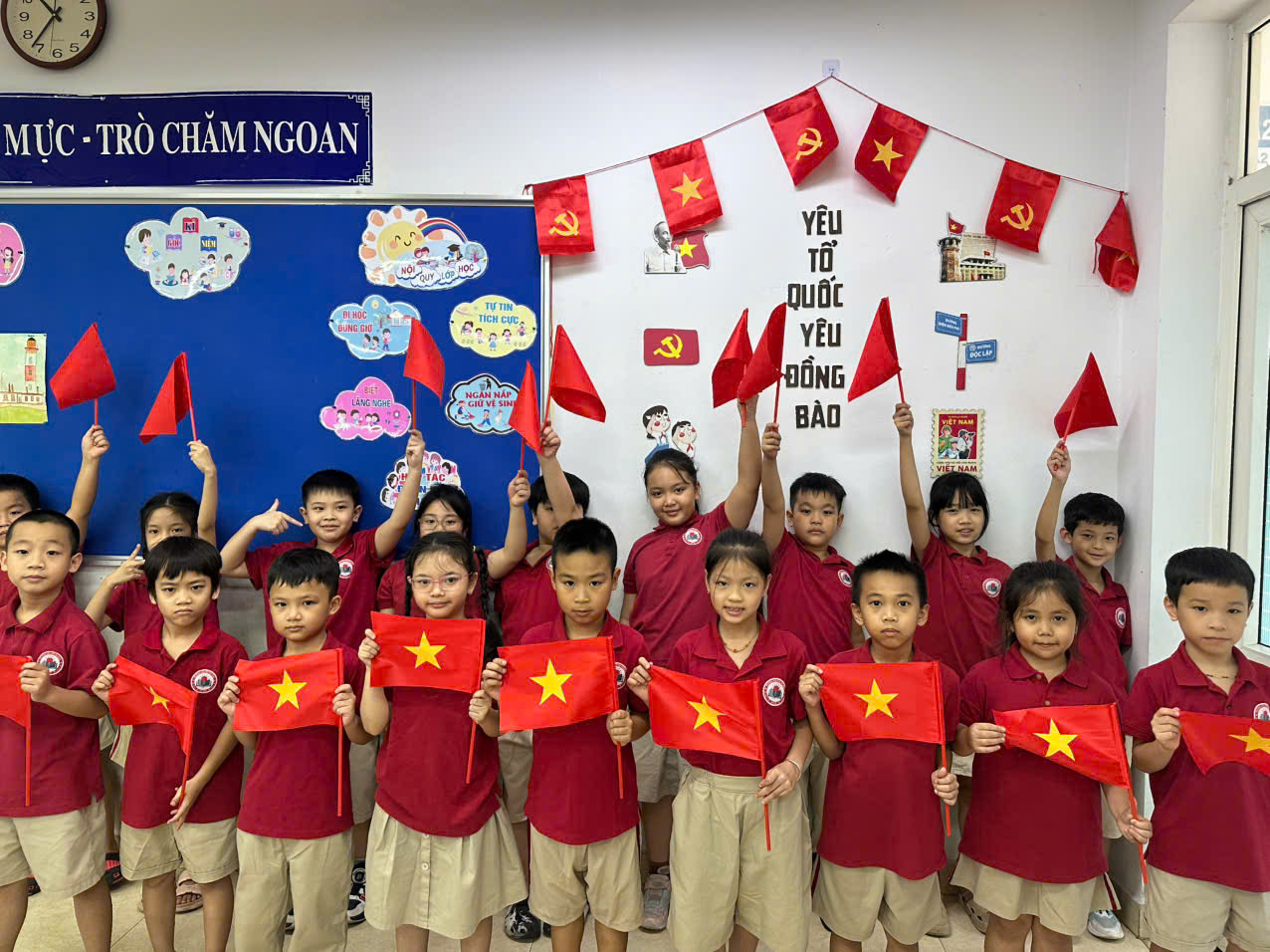 A group of children holding flags

AI-generated content may be incorrect.