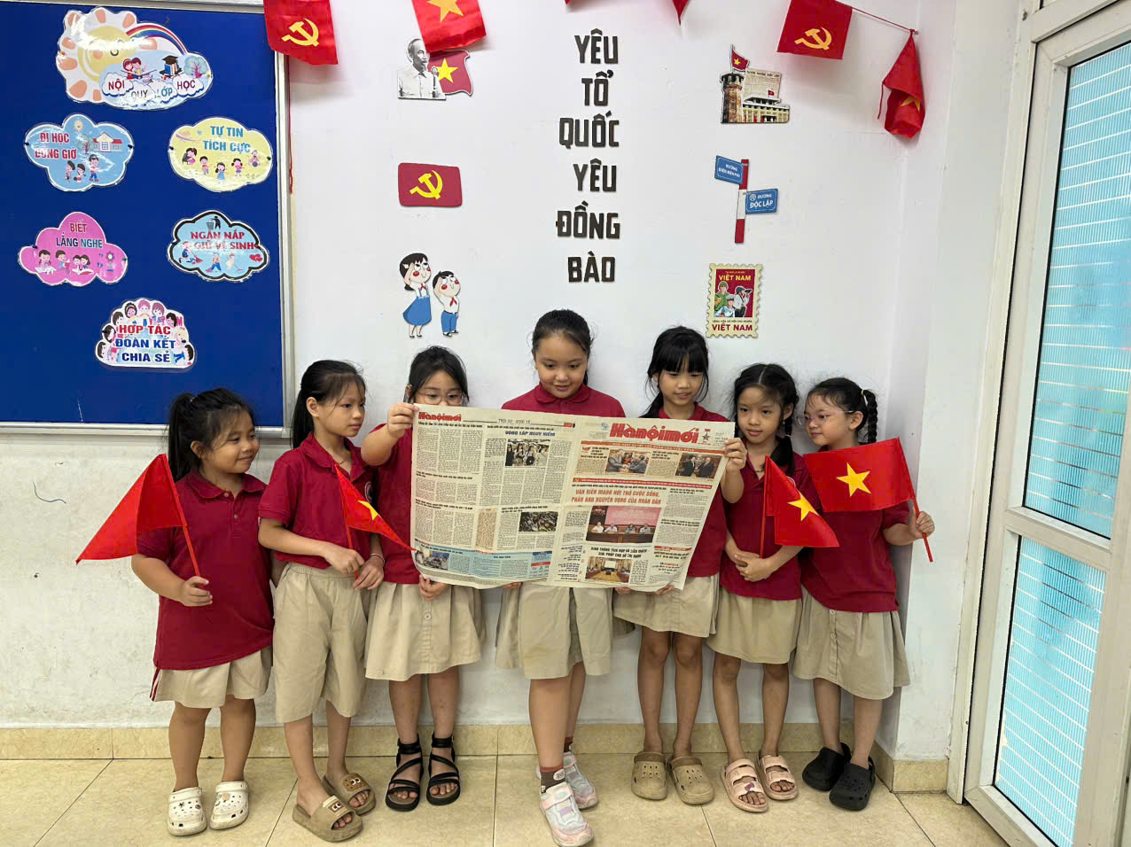 A group of girls holding a newspaper

AI-generated content may be incorrect.