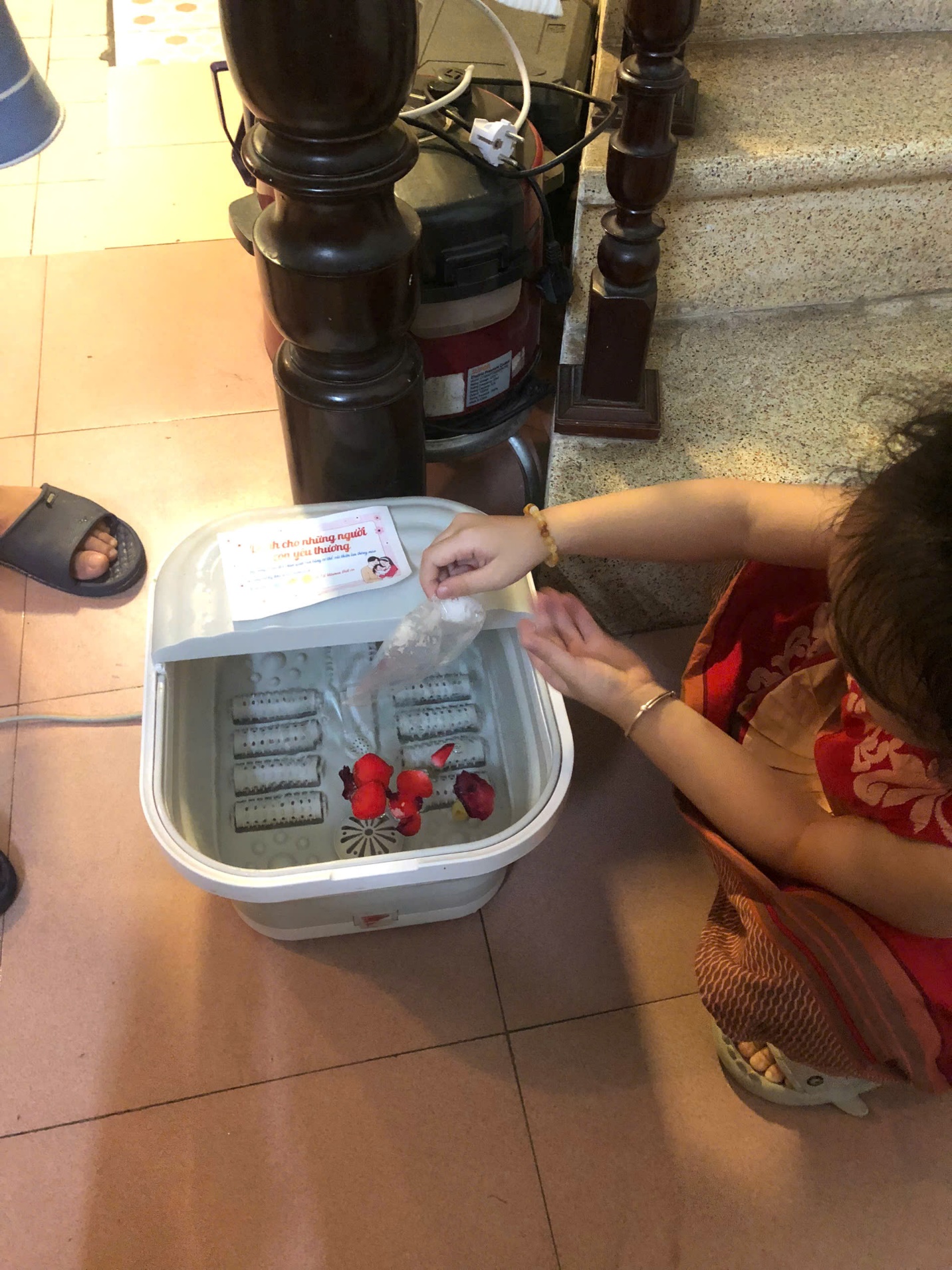 A person putting a bag into a bucket

AI-generated content may be incorrect.