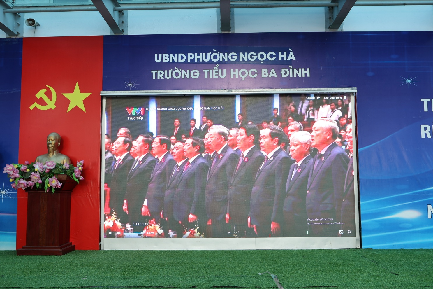 A person standing in front of a poster

AI-generated content may be incorrect.