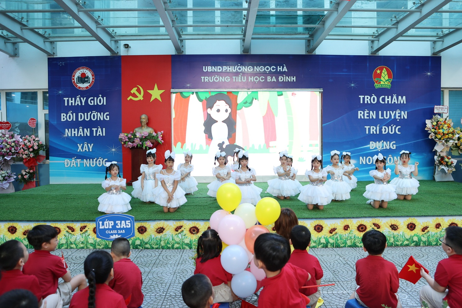 A group of children performing on a stage

AI-generated content may be incorrect.