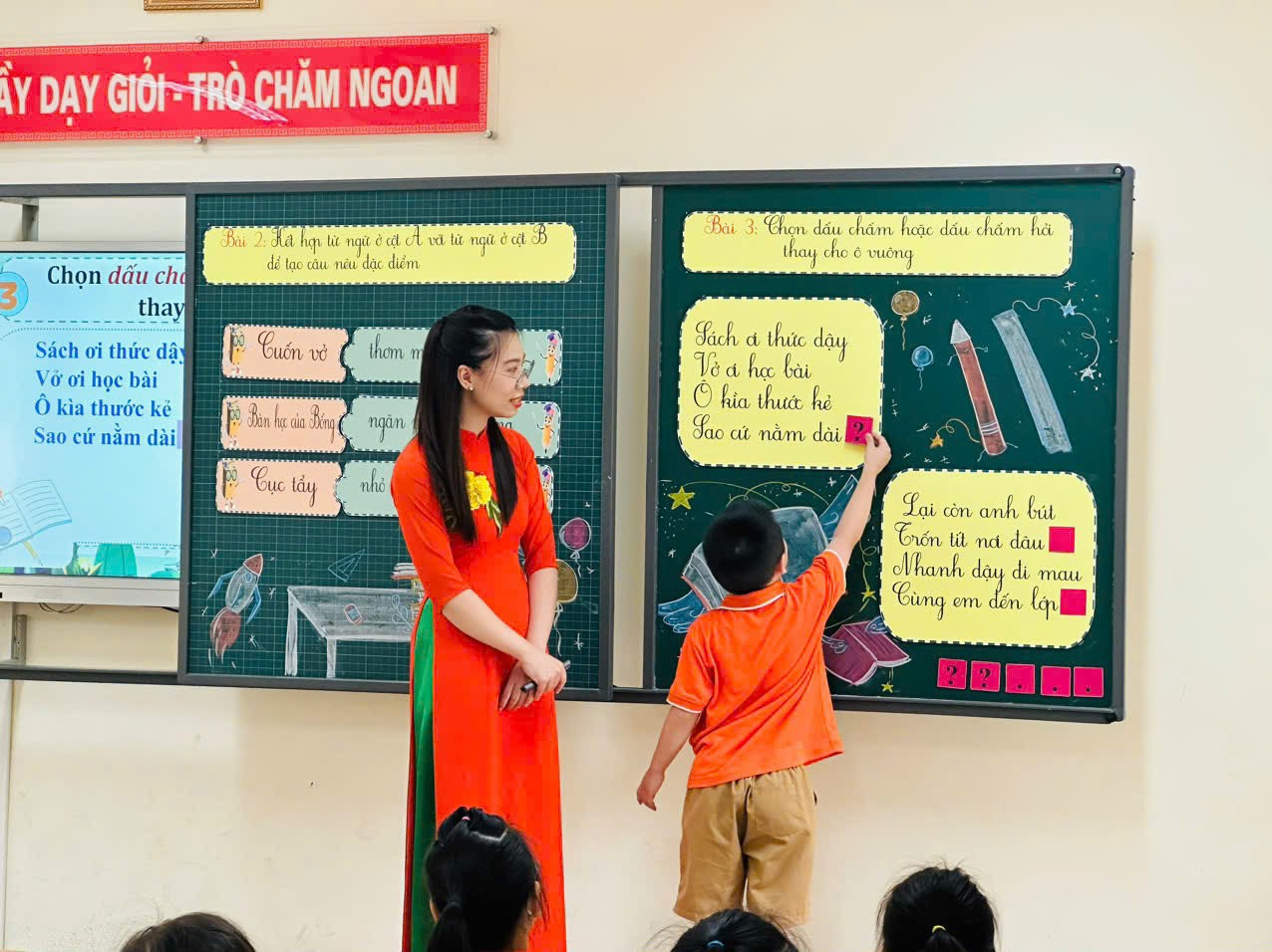 A person and a child standing in front of a blackboard

Description automatically generated