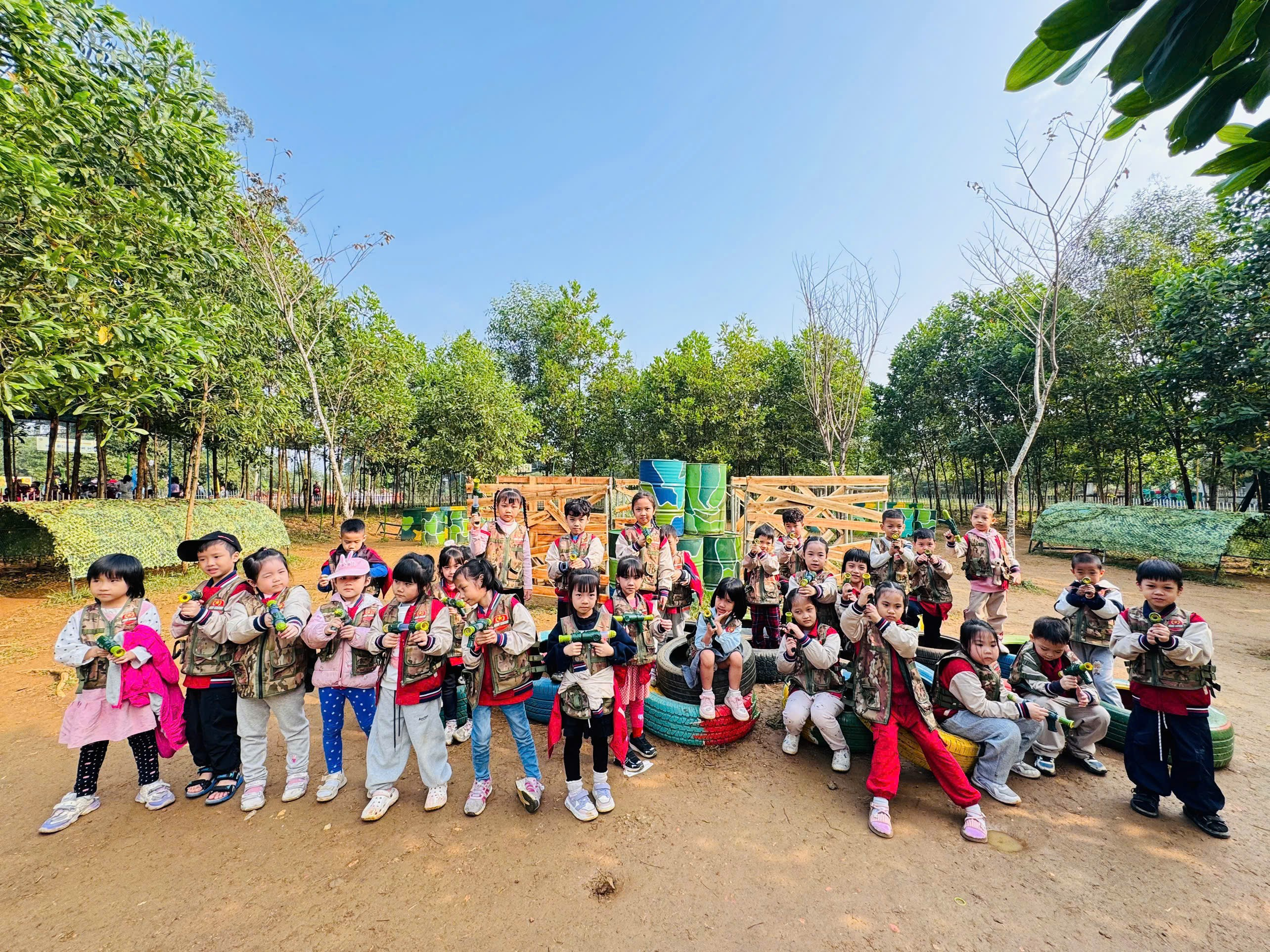 A group of children posing for a photo

AI-generated content may be incorrect.