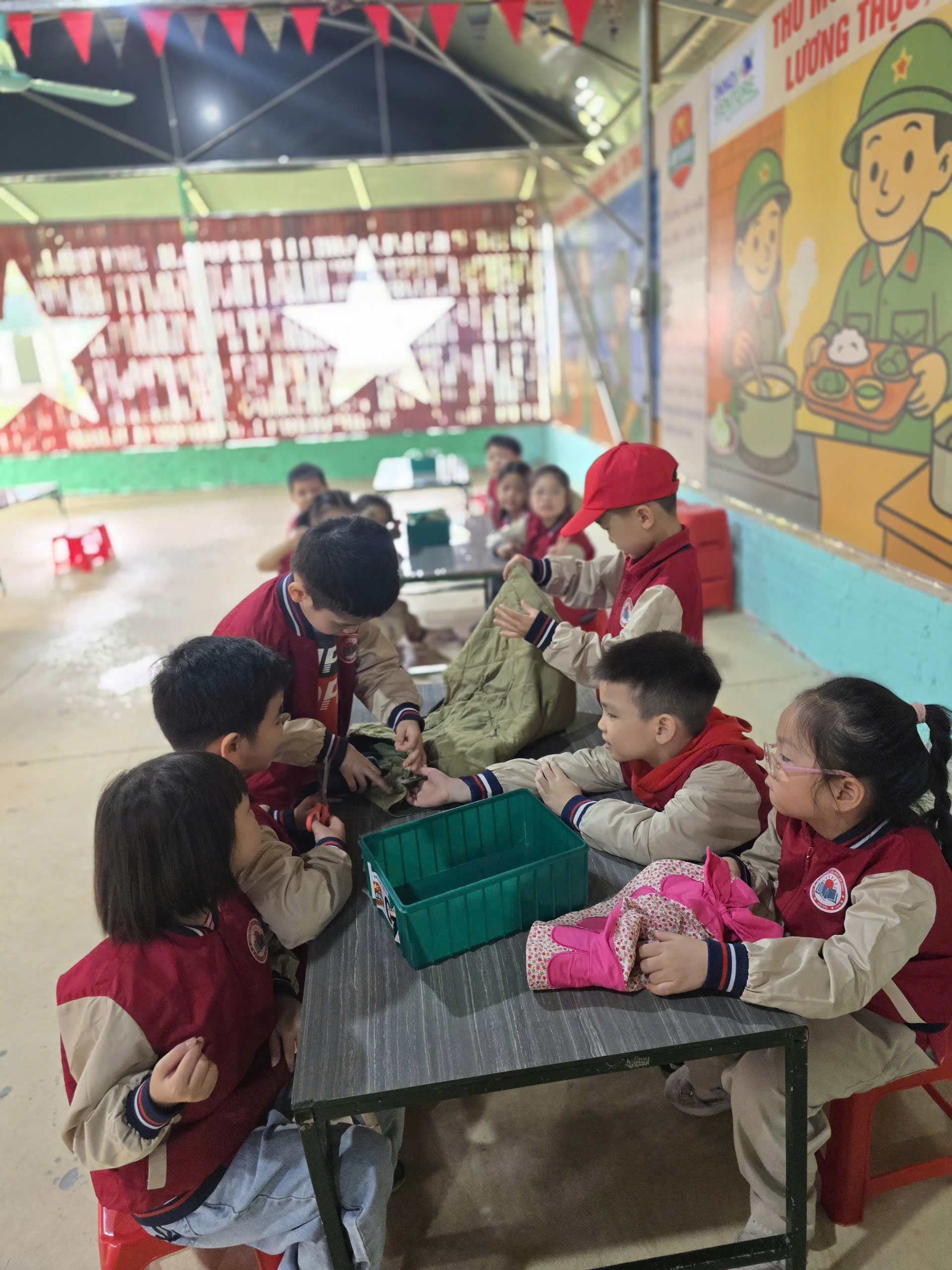 A group of children sitting at a table

AI-generated content may be incorrect.