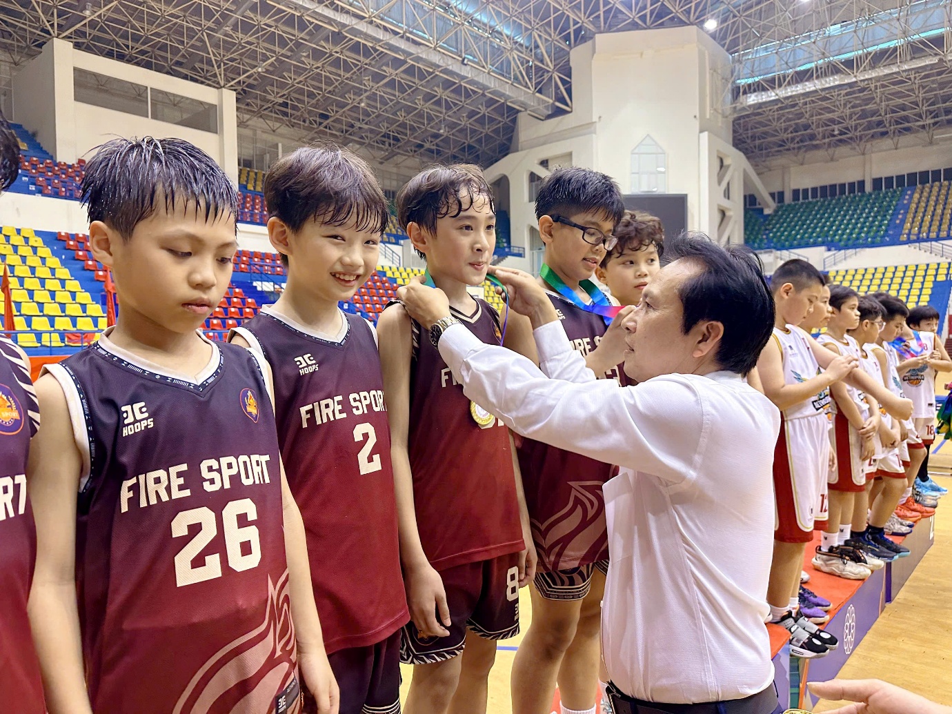 A group of boys in a basketball court

AI-generated content may be incorrect.