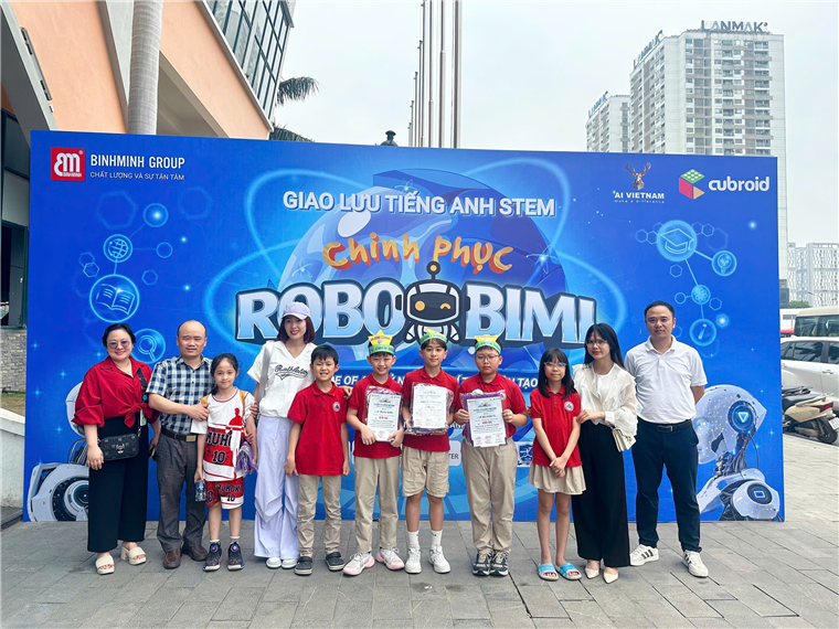 A group of people posing for a photo

Description automatically generated